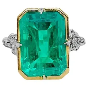 3ct Emerald in Forget Me Knot Ring Platinum and 22ct Yellow Gold