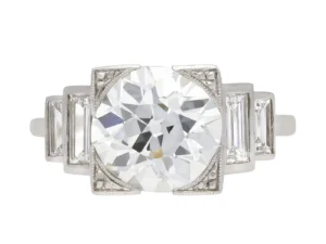 Art Deco diamond flanked solitaire